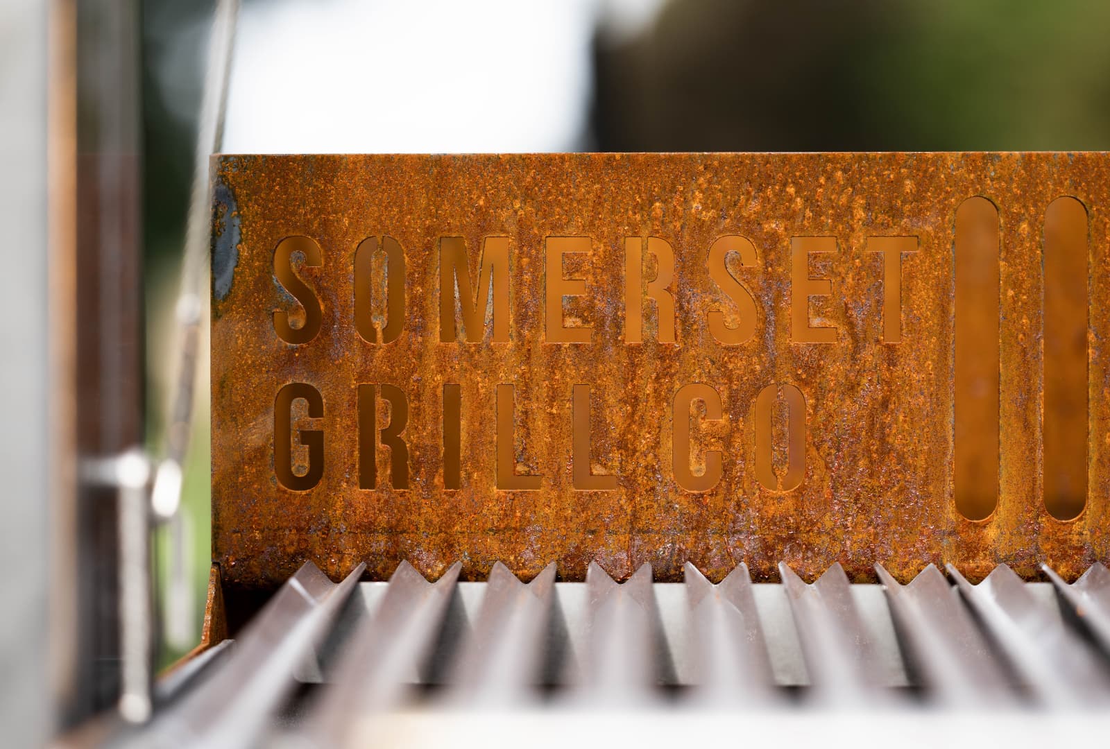 Somerset Grill Co Outdoor Kitchen with an Argentinian Grill Grande Cor-Ten Outdoor Kitchen Bundle