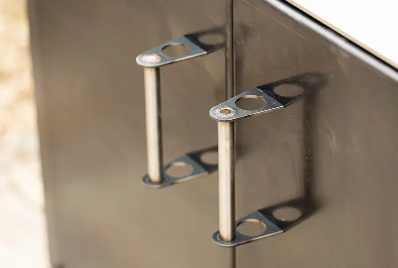 Close-up of gunmetal grey worktop unit doors with modern silver metal handles