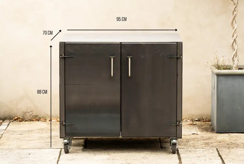 Grande gunmetal worktop unit with two doors and metal handles on caster wheels