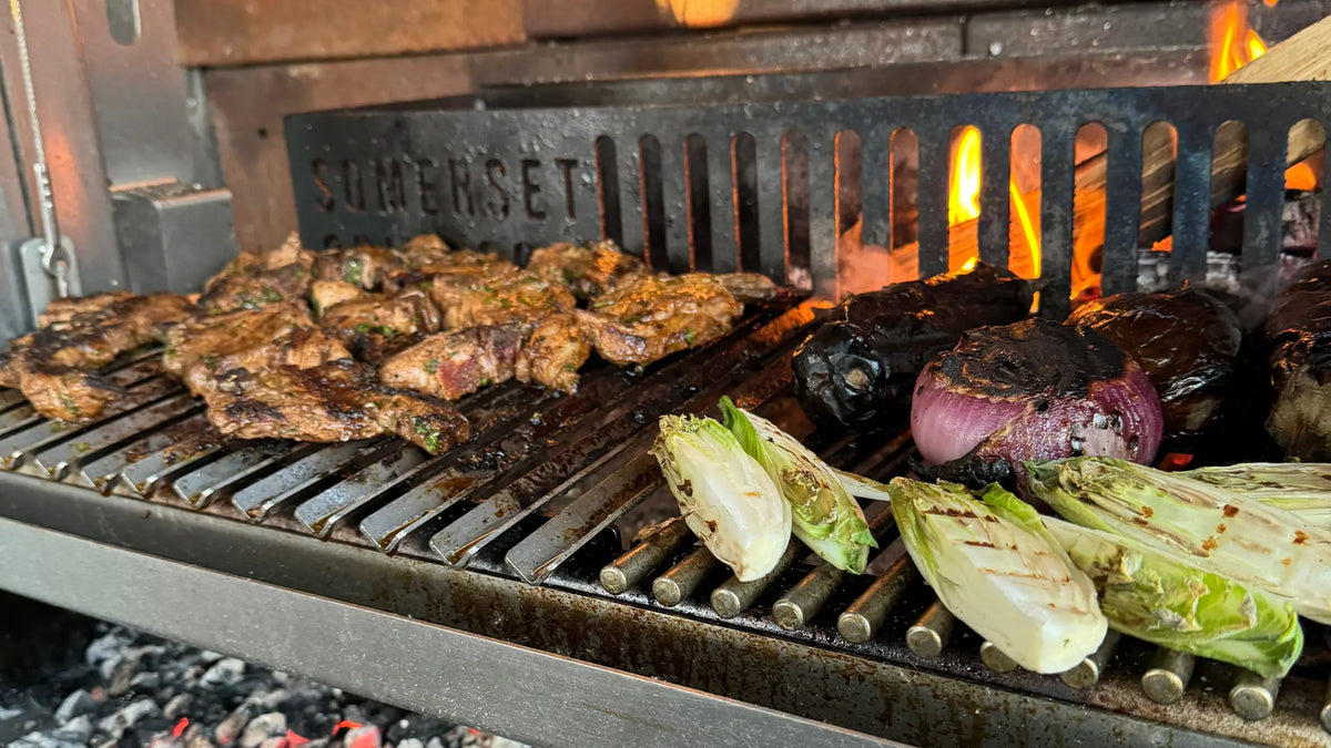Fire-Grilled Lamb Chops on Baba Ganoush with Burnt Onions